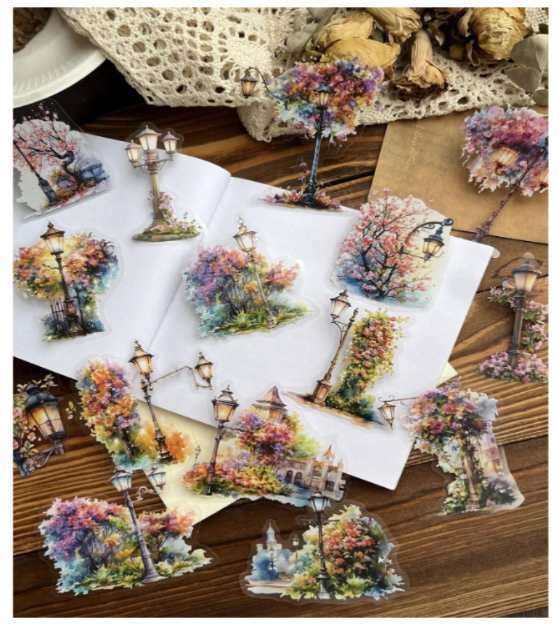 A collection of PET sticker designs featuring colorful autumn trees and vintage street lamps.